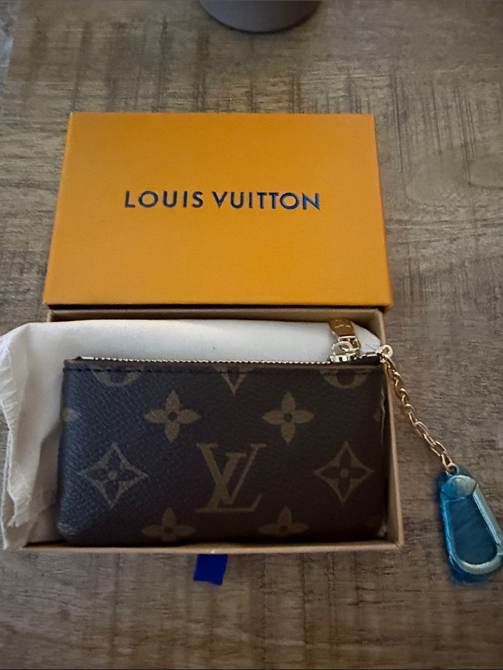 Louis Vuitton Monogram Key Pouch with Blue Charm